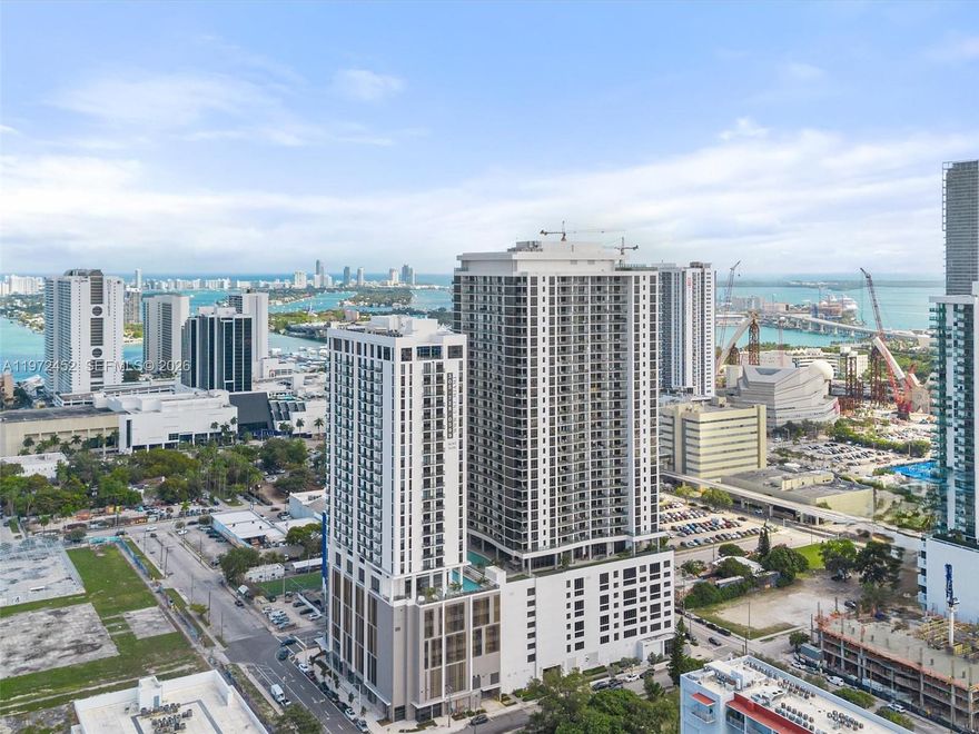 Very spacious 1 Bedroom, 1.5 Bathroom + DEN with incredible sunset views, located in the heart of Miami with easy access to major highways. Qualified buyers can purchase with only 3% DOWN, building has full reserves. HOA includes everything, and residents enjoy over 30,000 sq ft of resort-style amenities including 3 pools, jacuzzi, 3,000 sq ft state-of-the-art gym, spa, sauna and treatment room, racquetball court, theater, social room, 24/7 indoor/outdoor security, concierge, on-site management, self parking and valet. Motivated owner.