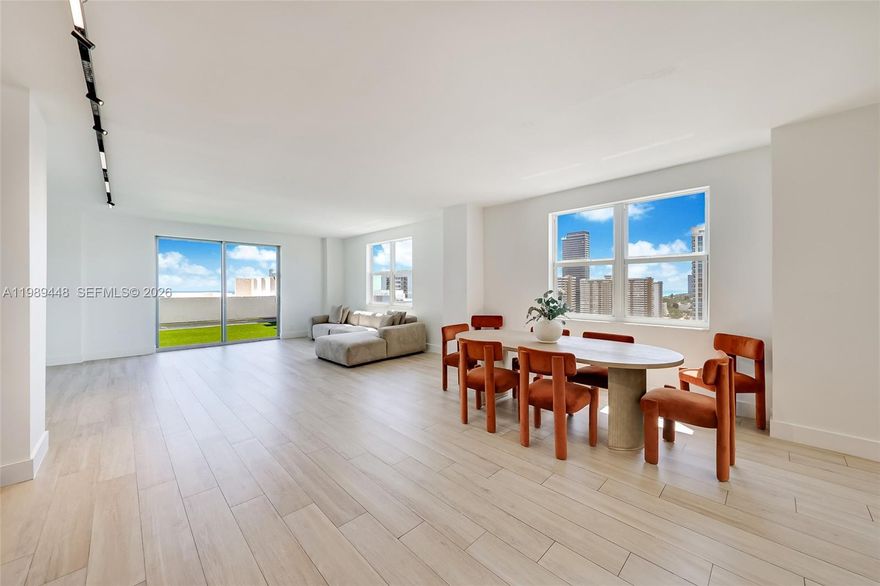 Penthouse residence offering 3 beds, 3.5 baths plus a Den/Office across 2,800+ SF of fully rebuilt electrical, plumbing, mechanical and a redesigned modern layout. Features include formal living and dining, spacious family room, and designer kitchen with leathered quartzite countertops, full backsplash, and luxury appliances. Premium finishes and high-end materials throughout. Panoramic unobstructed ocean views with rare North, South, and Intercostal exposures deliver natural sunlight from every room. A perfect blend to enjoy both an oceanfront and boating lifestyle. Expansive 950 SF private rooftop terrace which creates a seamless indoor-outdoor living. Full-service building in one of Hallandale’s most desirable location with marina/dock access, pool, spa, fitness center, tennis, 24/7 security, 2 covered parking, in-unit washer dryer, large storage, and near Aventura Mall and houses of worship.