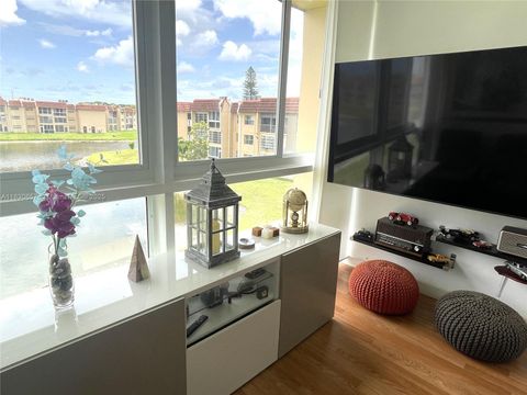 Photo of 8951 Sunrise Lakes Blvd #310, Sunrise, FL 33322 (MLS # A11830657)