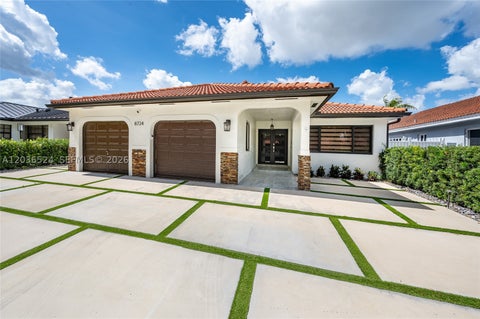 Photo of 8724 NW 149th Ter, Miami Lakes, FL 33018 (MLS # A12036524)