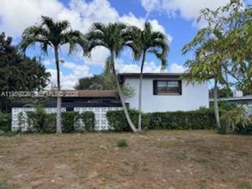Spacious 4-bedroom, 2-bath home featuring an oversized primary suite and a large backyard with plenty of potential. Roof is only 4 years old. Former pool has been filled in, offering expanded yard space. Ideally located with easy access to I-95 and the Turnpike, and just minutes from Aventura Mall. Property needs renovations — perfect opportunity to customize and add value.