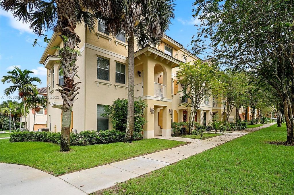 Photo of 3931 Passion Flower Rd, Coconut Creek, FL 33073 (MLS # A11466300)