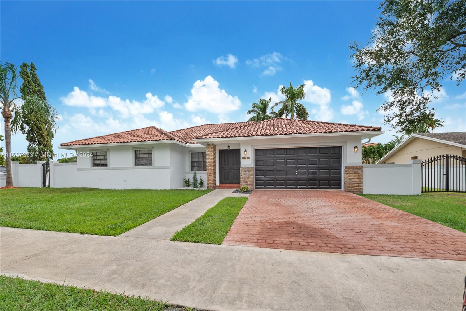 Spacious single family home on a corner lot for rent. 4 bedrooms and 3 bathrooms in Kendall. Home features vaulted wood ceilings and new tile floors in the bedrooms as well as updated bathrooms. Enjoy the large open family and living rooms. Relax in the large backyard and pool. 2 car garage. Nearby shopping centers and restaurants. Minutes to Miami Dade College Kendall Campus.