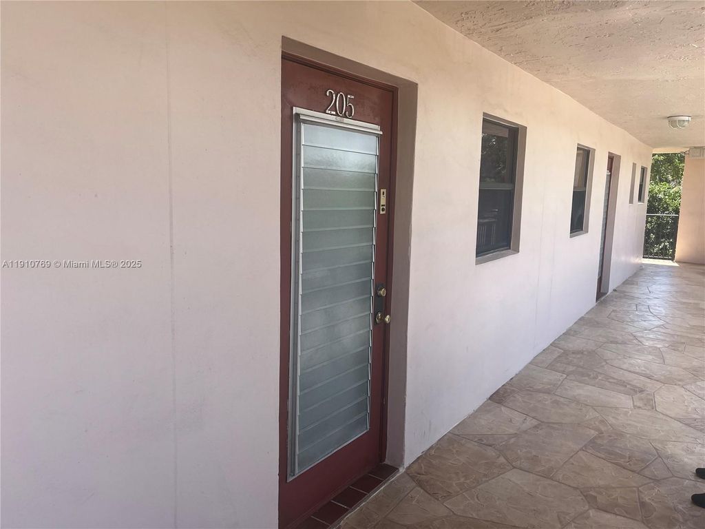 Photo of 10123 Sunrise Lakes Blvd #205, Sunrise, FL 33322 (MLS # A11910769)