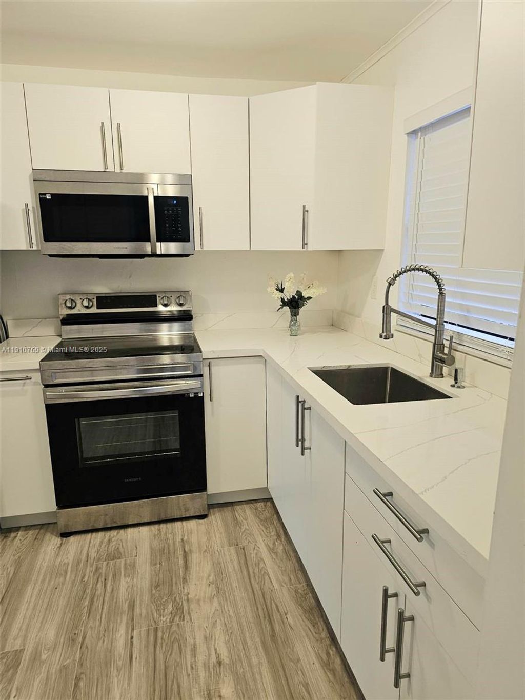 Photo of 10123 Sunrise Lakes Blvd #205, Sunrise, FL 33322 (MLS # A11910769)