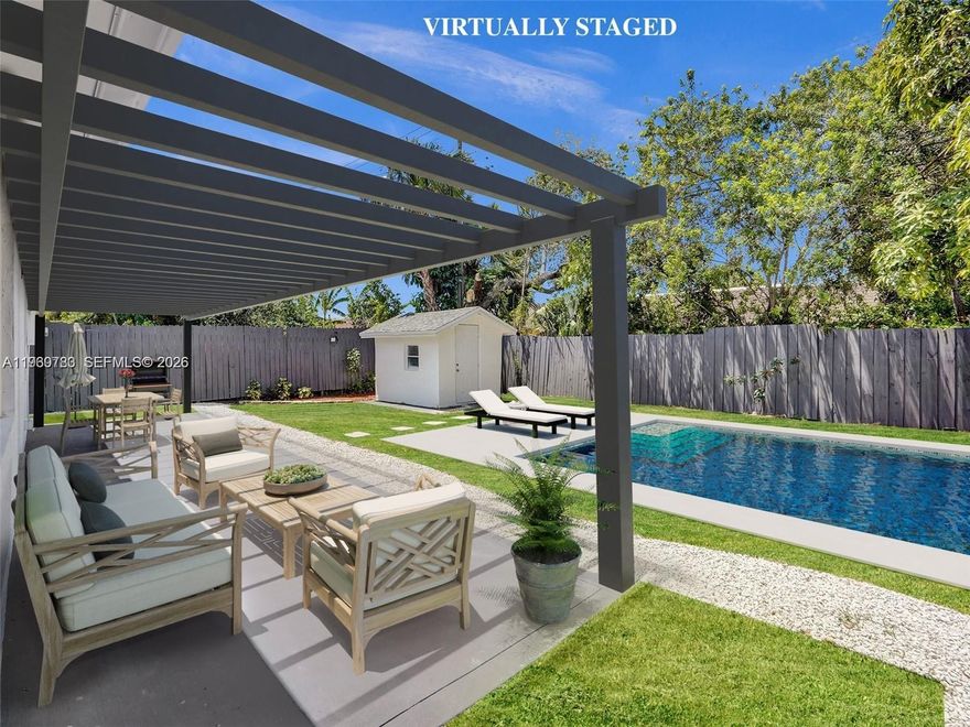 This beautiful home has been completely renovated WITH PERMITS, ensuring quality and peace of mind. Upgrades include a new roof with a 7-year warranty, a brand-new water heater, an updated electrical panel, recently installed impact windows and doors, improved kitchen, elegant new flooring, upgraded bathrooms, and a freshly painted interior and exterior. Plus, a spacious backyard with an updated tool house with enough room for a pool. Move-in ready with top-tier upgrades—don’t miss out! Some pics have been modified and/or virtually staged.