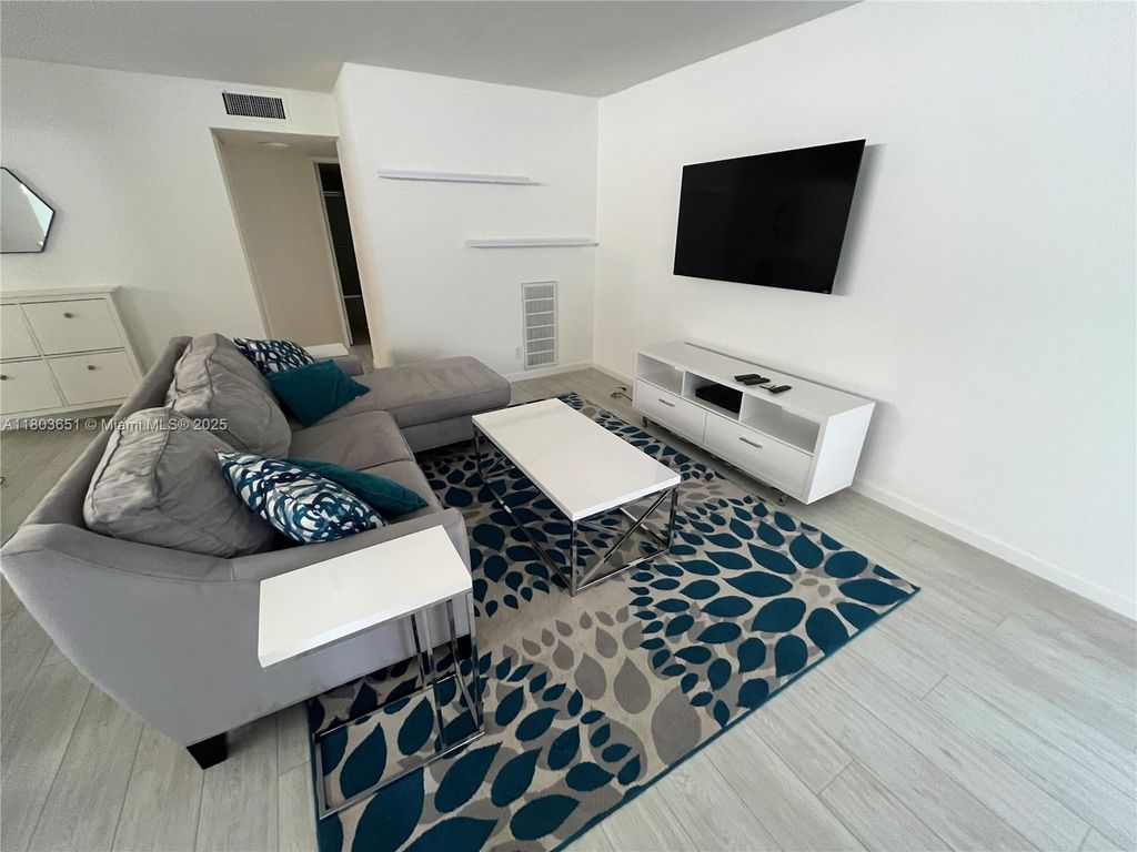 Photo of 5850 Camino Del Sol #206, Boca Raton, FL 33433 (MLS # A11803651)