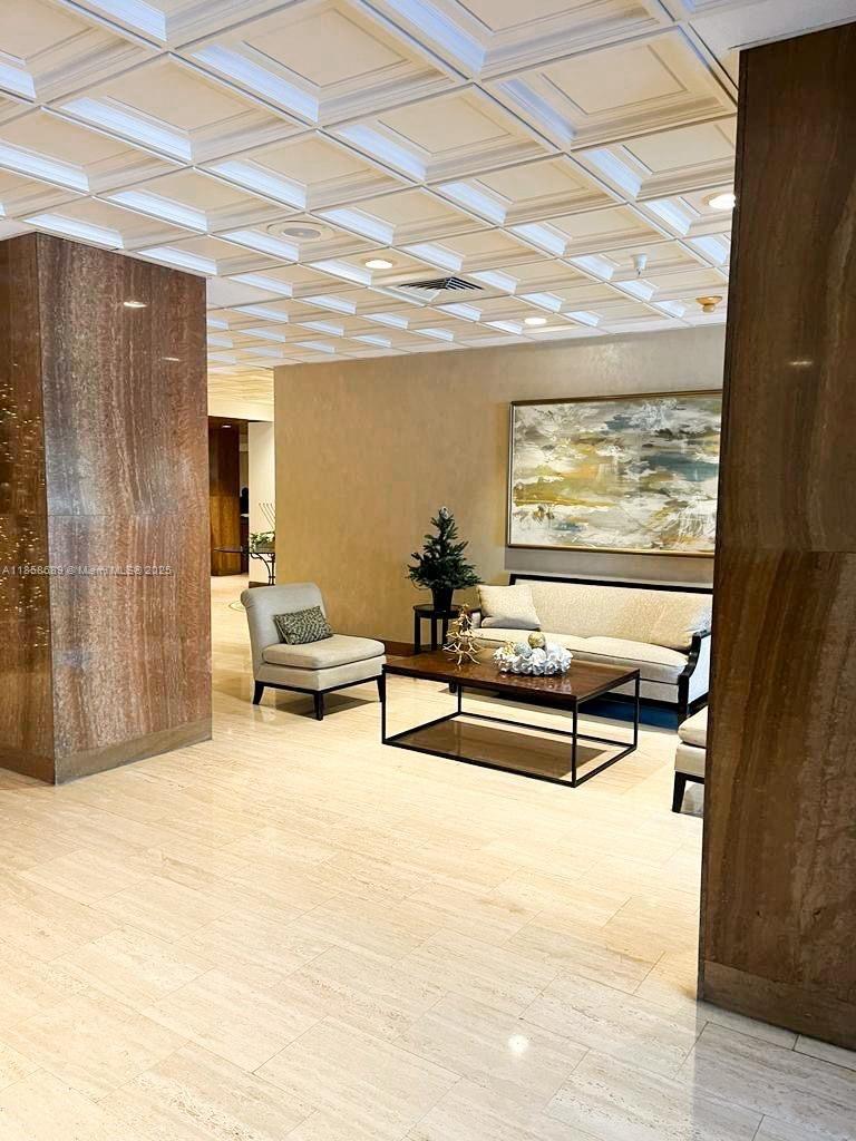 A beautifully remodeled 2/2 unit with additional powder room or half bath. White quartz counter tops in kitchen, baths and wet bar. Marble floors throughout the unit, freshly polished. Enclosed balconies with impact resistant glass windows and doors make this a huge unit with spectacular bay and city views. Brand new washer and dryer is located in a separate laundry room, with a sink. Building has a gym, 5 tennis courts and a pickle ball court along with a huge pool overlooking the bay. Unit includes one covered parking space and additional parking spaces are available for rent if needed. Valet parking is available for guests. Security 24 hours.