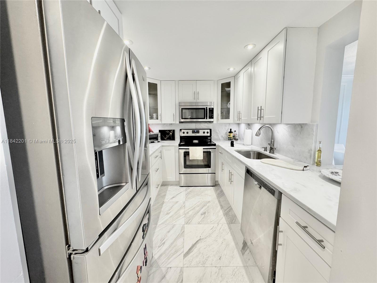 Beautifully Remodeled 1-Bed, 1.5-Bath Condo – Just 1 Mile from the Ocean!
Furnished, spacious, and tastefully remodeled, this bright 1-bedroom, 1.5-bath condo offers stylish living with serene views of the lushly landscaped common areas. Located on the 3rd floor, the unit features laminate flooring throughout and a modern kitchen with elegant marble floors, quartz countertops, and custom wood cabinetry.
Enjoy the expansive dining and living area that opens to a screened patio—perfect for relaxing or entertaining.
This pet-friendly, gated community includes great amenities: a heated pool, tennis courts, and more. Ideally located just east of US-1, a mile from the beach, near I-95, and minutes from Hollywood International Airport.