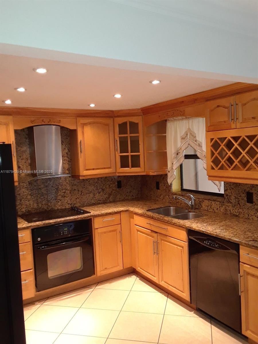 Remodeled townhouse in Lago Grande. 4 spacious bedrooms, 2 & a half bathrooms. Enclosed patio with washer and dryer, sink and cabinets. LAKE VIEW from the patio. The kitchen features wood cabinets, granite counter tops, nice appliances, tile floors throughout. Renovated bathrooms. Gated community with 24/7 security guard at gate, community pool, management on-site, small pets allowed. MOVE IN WITH 1ST MONTH & 1 MONTH SECURITY DEPOSIT.