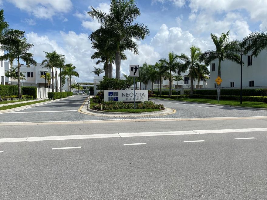 Discover luxury living in the esteemed gated community of NEOVITA Doral with this stunning townhouse. Boasting 4 bedrooms and 3 full bath, including a convenient bedroom with a full bathroom on the first floor. Kitchen Island, top of the line stainless steel appliances. Extra versatile room, ideal for an office or game room 1-car garage, 2 cars driveway, and guest parking available. high impact windows and NO carpert. Nice patio with artificial grass  Top-rated schools located nearby. Just 20 minutes from Miami International Airport, easy access to major highways such as Turnpike and 836. Access to abeautiful clubhouse, swimming pool, multipurpose room, Gym, and playground. Don't let this opportunity pass you by—experience the epitome of luxury living in this prestigious Doral community.