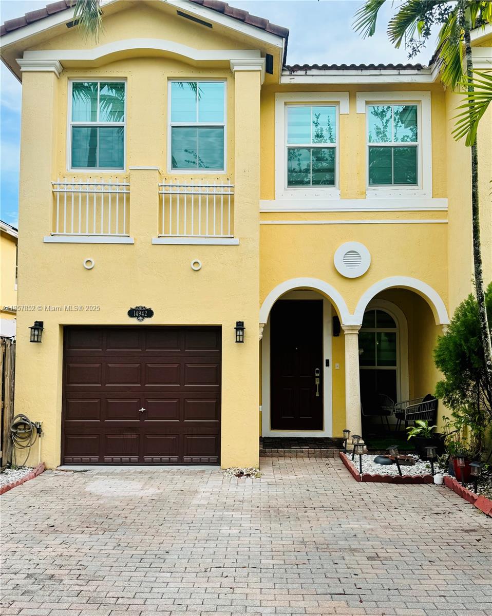 PRICED TO SELL! Don't miss out on this stunning townhouse in Grand Lakes, offering a unique and spacious design with 4 bedrooms, 2.5 bathrooms, and a one-car garage. This home boasts a fully remodeled kitchen and bathrooms, impact windows for peace of mind, a new fence, and concrete patio floors-perfect for enjoying your morning coffee. Freshly painted interior and all appliances are just 2-4 years old. Centrally located, move-in ready, and ideal for those seeking comfort and style!