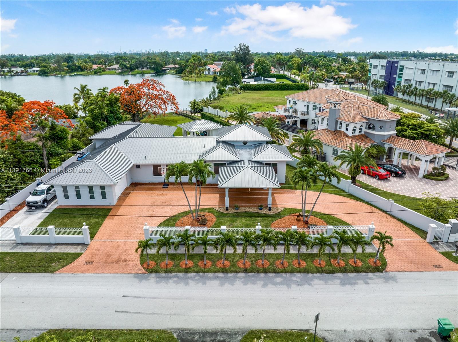 *NOT SUBJECT TO APPRAISAL* 24,629 s/f lot, offering a truly grand living experience. As you approach, you are greeted by a circular driveway, a porte cochere, and a 2-car garage. Boasting 5 bedrooms and 4.5 bathrooms within a sprawling 6,304 total s/f, this home provides ample space for comfortable living. The kitchen features top-of-the-line stainless steel appliances, including a side by side, stand-alone fridge and freezer, along with wood cabinets that reach the ceiling. The addition of beautiful quartz countertops adds a touch of elegance to this culinary haven. Impact windows and doors throughout. The roof was also redone in January 2021. Step outside to the covered terrace, overlooking the inviting pool area and vast backyard, perfect for outdoor entertainment and relaxation.