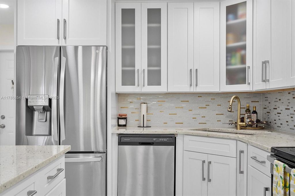 Photo of 5001 Riverside Dr #303, Coral Springs, FL 33067 (MLS # A11786854)