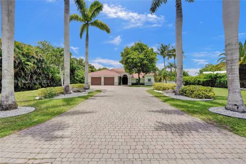 Photo of 5963 NW 75th Way, Parkland, FL 33067 (MLS # A11883616)