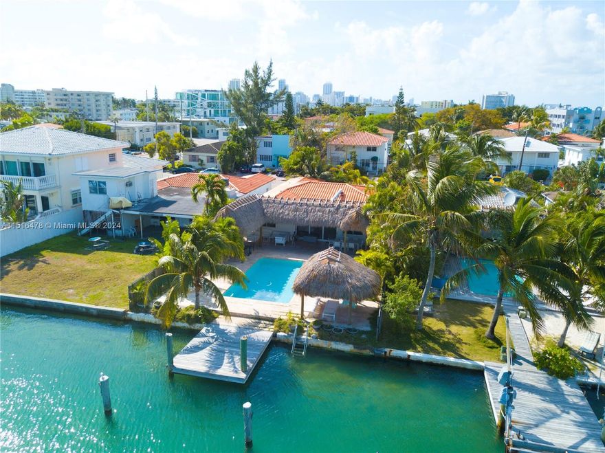 Amazing waterfront residence and a rare find on Miami Beach! This stunning home has been fully remodeled. Boasting 4 beds/3 baths, a large open eat-in kitchen, open floor plan with views of the bay, tile floors throughout, spacious bedrooms, recessed lighting, Private fenced in backyard, private boat dock, new pool, and an outside tiki hut overlooking the wide bay views. This residence is perfect for entertaining! Enjoy Michelin star restaurants, stunning beaches, and world-class shopping nearby in Bal Harbour.