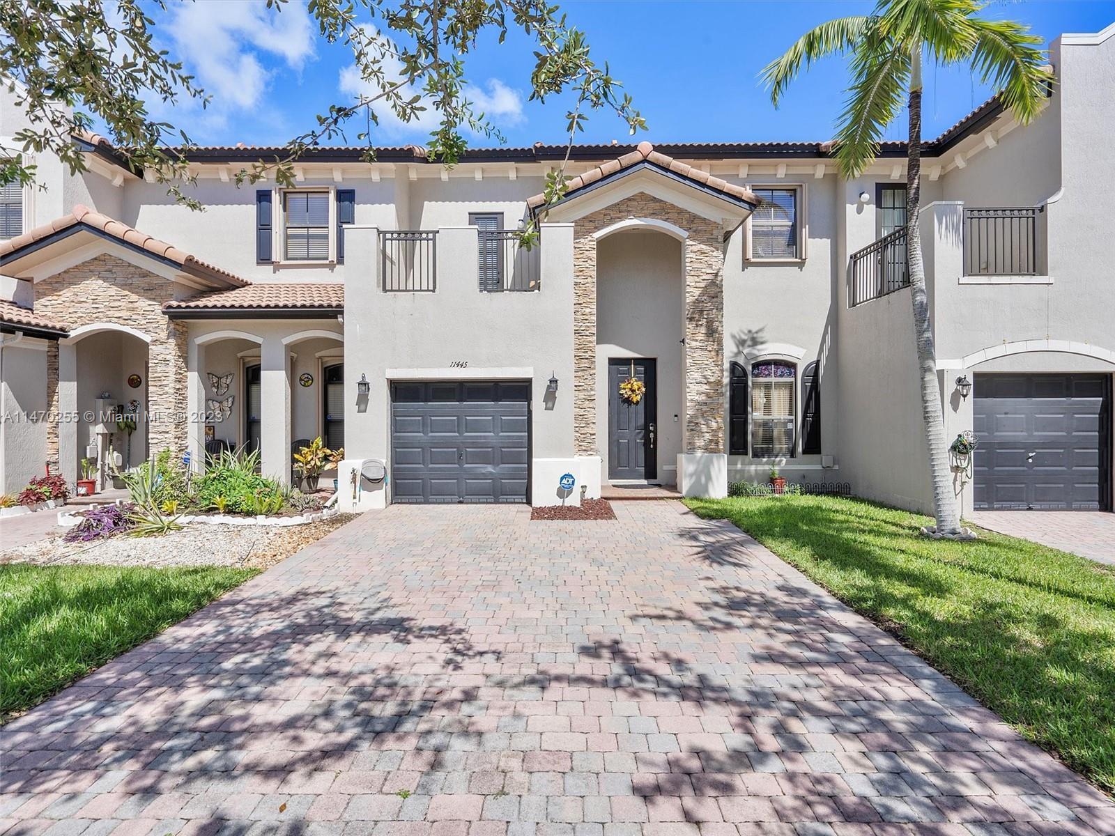 Welcome to this spacious 3bedroom, 2.5bath townhome in the sought-after community of Silver Palms by Lennar. This home features an open floor plan, wood floors throughout, washer & dryer in unit, hurricane shutters, a fully fenced backyard patio with pavers, a bedroom balcony, front porch, and garage. The community offers a resort-style clubhouse including: pool, gym, sauna, basketball court, and more. Centrally located near schools, shops, public transportation and the turnpike (exit 9) and Palmetto expressway. Super low HOA fees makes this home perfect for a primary residence, investment, or second home. Tour today and move in quickly.