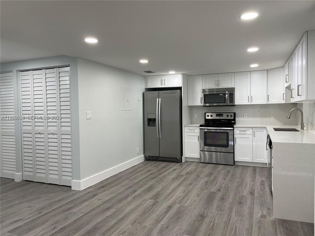 Photo of 4725 SW 62nd Ave #103, Davie, FL 33314 (MLS # A11999538)