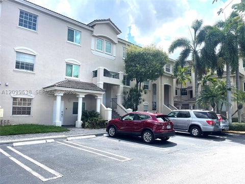 Photo of 5640 NW 115th Ct #208, Doral, FL 33178 (MLS # A12099638)