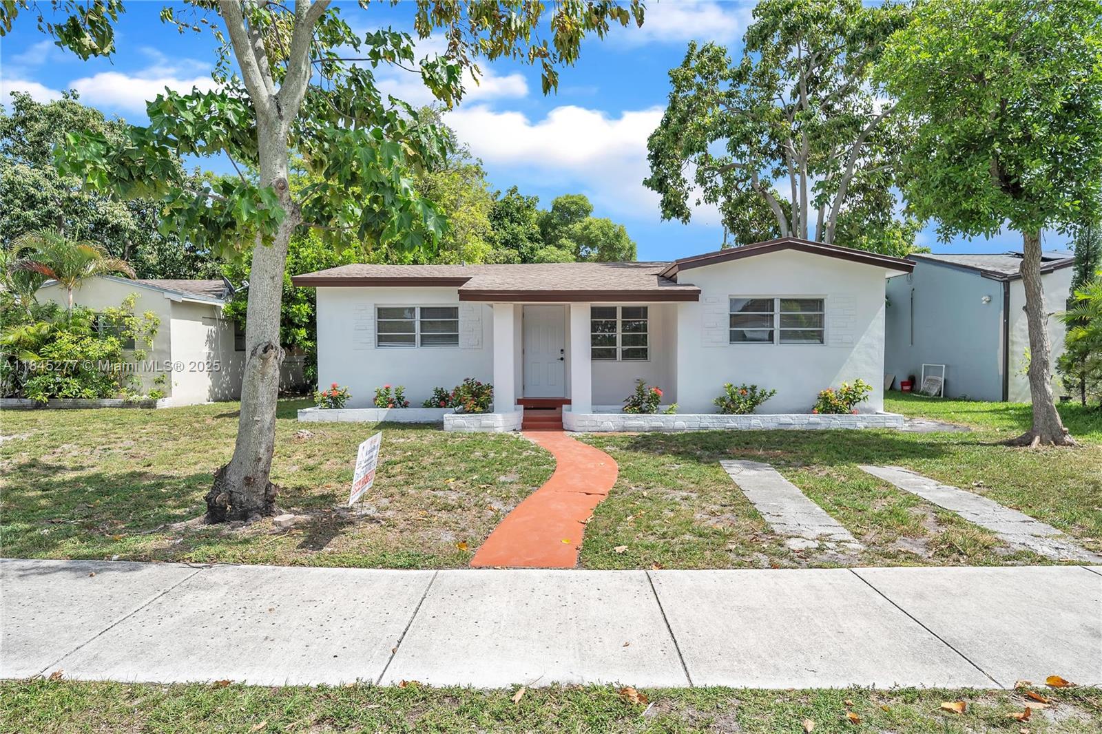 This is a completely remodeled four-bedroom, two-bathroom home. It features a new kitchen, an updated shower, and tile flooring throughout the property. The home also includes a tankless water heater, stainless steel appliances, and granite kitchen countertops with a granite backsplash. The roof work was completed with permits in less than three months.This beautiful home is just 3 miles from Hollywood Beach and very close to downtown Hollywood. This home is on a 7,004 S/f Lot, on a quiet side street in a great neighborhood WITH NO HOA. NEW ROF, , NEW water heater, NEW kitchen appliances, Move-in-ready Hollywood. Perfect for outdoor living and future potential. Stylish, secure, located!. The huge backyards, Plenty of room for a pool, also has a storage shed.