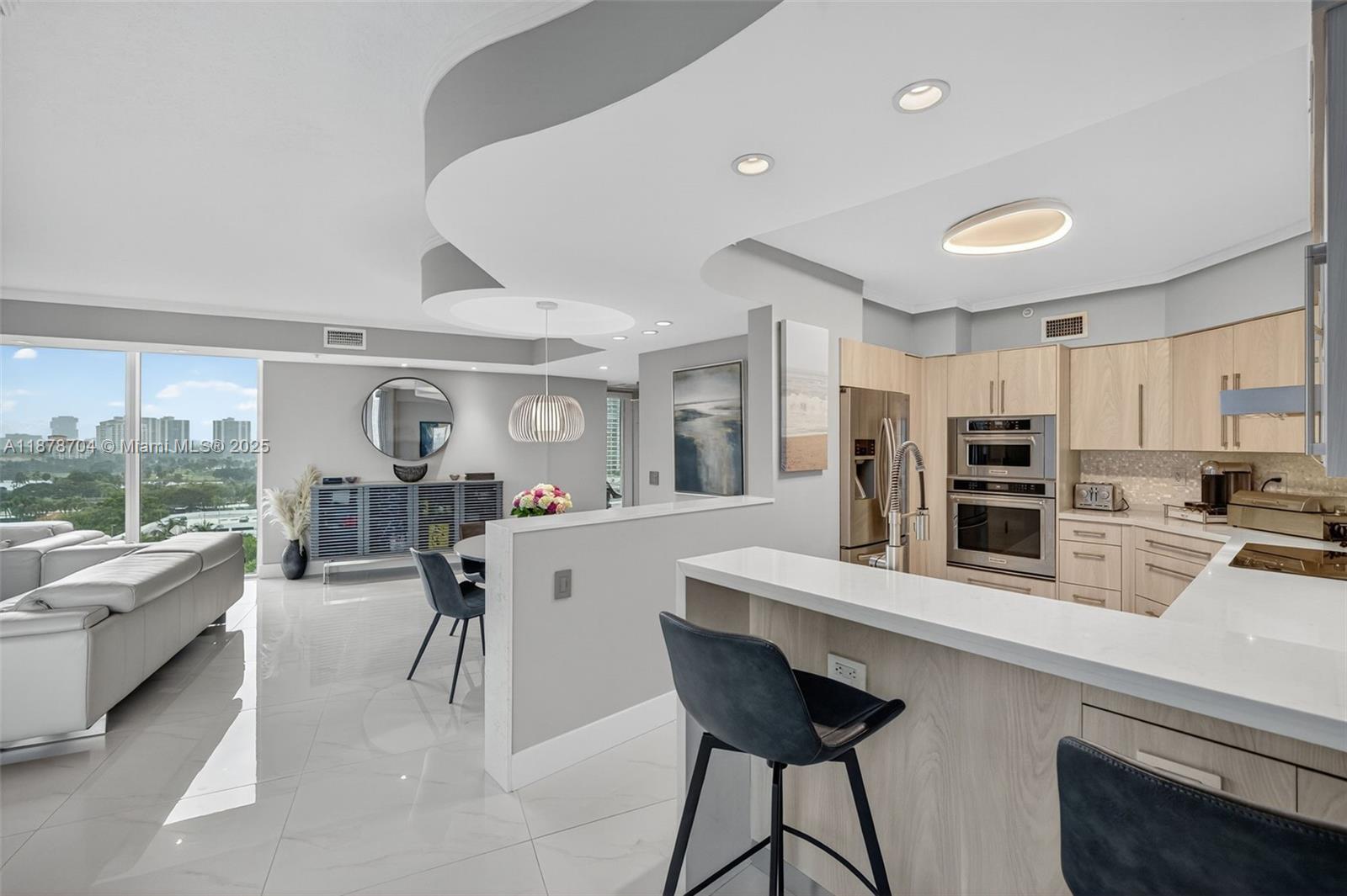 A perfect 10! Enter this fabulous 100% renovated residence from semi-private elevator foyer and be wowed by the East & West water, intracoastal, ocean, golf, lake, & city views from floor to ceiling windows. Features the finest finishes including new open kitchen, all new baths - light - white - grey and stunning. All light tile floors throughout, custom closets, & more
5 Star Amenities include: 2 Story Health Club with Gym and Spa, 2 Pools, 3 Tennis Courts, 2 Pickle Ball courts, Private Marina, Valet, Security, BBQ Area, Library, Kids Game Room, & much more.