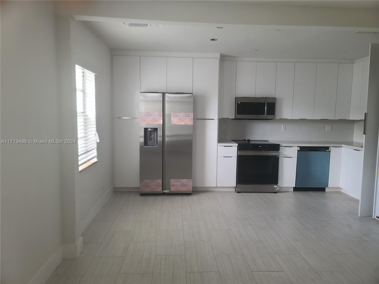 1041 Nw 32nd Pl, Miami, Broward County, Florida - 3 Bedrooms  
2 Bathrooms - 