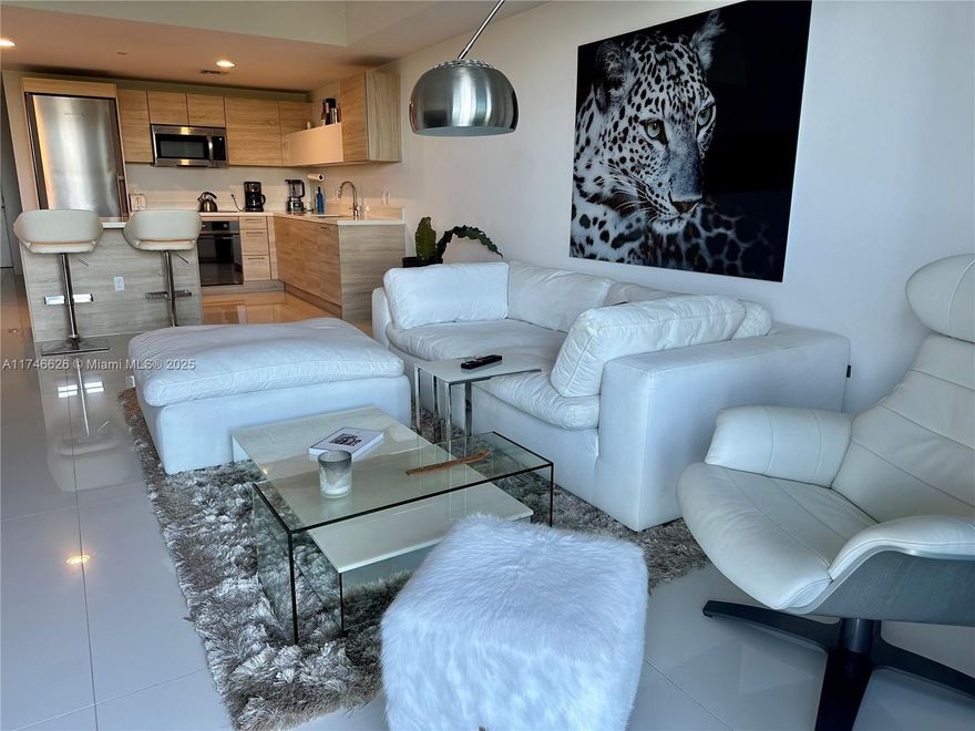 Live in luxury at The Harbour, North Miami Beach’s premier residence! This stunning 2-bedroom, 2-bath + den unit includes 1 assigned parking space, with an option for a second spot at extra cost—a rare find! Enjoy elegant light porcelain floors and breathtaking views of Oleta River Park and Biscayne Bay. The Harbour offers world-class amenities: heated infinity pool, full spa, Jacuzzi, sauna, and state-of-the-art gym. Residents also enjoy a private beach, paddleboard/kayak access, sports courts, dog park, kids' playroom, and outdoor restaurant. Ideally located minutes from Aventura Mall, Bal Harbour Shops, and Sunny Isles Beach. Tenant approval: 650+ credit score, income 3x rent