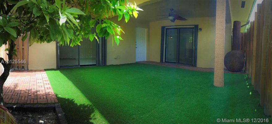 Lovely 3/2.5 townhouse in very desirable Hammocks-Kendall area. Enjoy the private garden with access to spacious eat-in-kitchen or walk in to open living area. Completely remodeled, luxury kitchen design with granite countertop, stain steels appliances, wine cooler; custom made laundry closet, tile floor on first level and wood floors on second level. All built-in closets, accordion shutters throughout. 30 days warranty on all appliances and equipments. Quiet neighborhood, community pool. Low assoc fees.