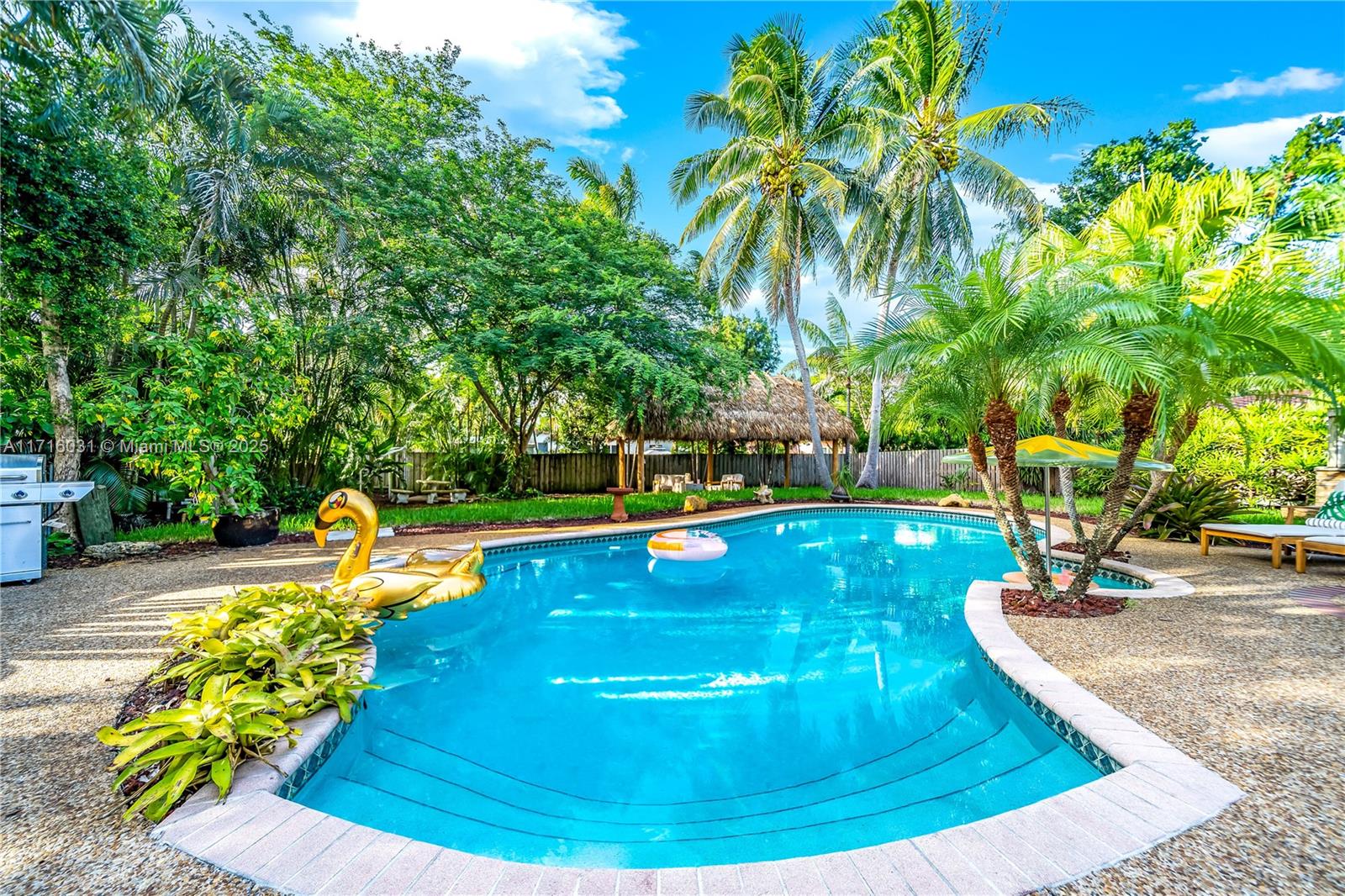 Welcome to your dream home! This stunning 3-bedroom, 2-bathroom residence features a desirable split floor plan, and large bedrooms offering both privacy and spacious living. Outside is your own private oasis—an expansive backyard complete with a heated pool, jacuzzi, and a charming tiki hut, ideal for year-round enjoyment. Situated on a rare double lot, the tropical landscaping enhances the tranquil atmosphere, making it feel like you’re in your own personal resort. Located in a sought-after neighborhood, this home is just minutes away from the beach, the vibrant Wilton Manors, and downtown Fort Lauderdale, where you’ll find restaurants, shops, and entertainment. You’ll love the perfect blend of privacy, luxury, and convenience that this home offers—also could be an amazing AirBnB!