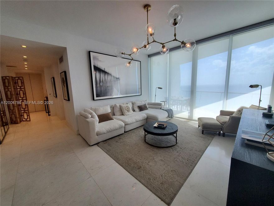 AMAZING OCEAN FRONT UNIT. Gorgeous 1 Bed + 1 Den, 2 Bath condo with an open layout, high-end appliances, and modern decoration. Private elevator. Storage Area. 1 assigned parking spot plus valet parking. Three floors of common areas with top-of-the-art amenities, including a Club Room, Breakfast Cafe, Library, Business Center, Playroom, Beach bar and grill, Fitness Center, Spa, Sauna, Beauty Saloon, Techno-gym, etc.
