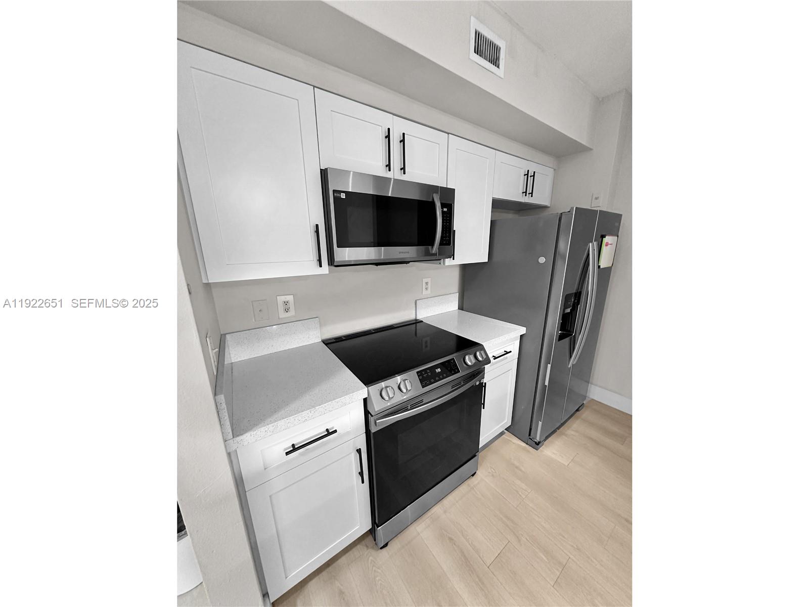 EL-AD RESIDENCES AT MIRAM - Residential Lease