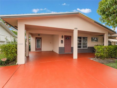 Photo of 4938 NW 48th Ave, Tamarac, FL 33319 (MLS # A11965011)