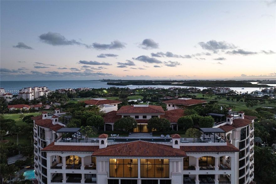 Set atop Palazzo Della Luna, Penthouse 6802 is Fisher Island’s premier sky residence. Spanning 10,194 SF± of interior space and nearly 2,000 SF± of terraces, this full-floor penthouse includes 5 bedrooms, 5 full and 3 half baths, panoramic views of the ocean, bay, and Miami skyline, and a 7,300+ SF± private rooftop with zero-edge heated pool, spa, summer kitchen, two wet bars, and multiple entertaining areas. Includes a private cabana, deeded beach access, and Fisher Island Club membership. Enjoy 6-star concierge service, security, and access to golf, racquet club, beach club, marinas, and more—all within one of the most private communities in the U.S.