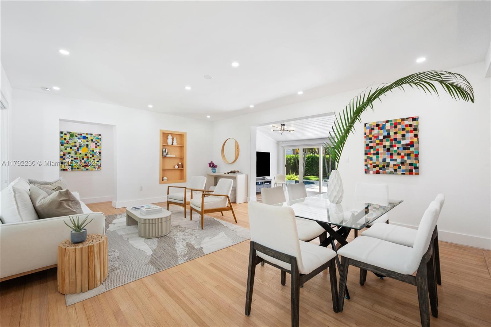 Beautifully updated 3BD/4.5BA home on one of Miami Shores’ most canopied & walkable streets is move-in ready. This single-story w 3 BD w 4.5 BA offers an open layout ideal for a young family or for an empty-nester looking to age in place comfortably. Enormous 13,619 SF corner lot in Flood Zone X (no lender-required flood insurance) w a bright Florida room that opens to a large patio & pool. Features include impact windows/doors, newly renovated kitchen & baths, hdwd floors, custom closets & blinds. Versatile room is perfect for an in-law suite or office. Attached 2-car garage, fenced backyard & expansive lawns. Close to highly rated schools, parks, & cafes. Quiet, charming neighborhood w mature trees & magnificent green spaces just minutes from downtown, Design District, and beaches.