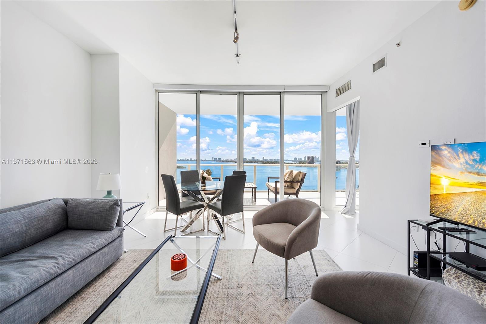 Stunning sanctuary at Paramount Bay makes it easy to live with style and enjoy the lux Miami lifestyle. This concerted 2-bed/2-bath residence offers breathtaking views of Biscayne Bay, the Port of Miami and Margret Pace Park. Stand-out features include elevator access with private foyer, soaring 10’ ceilings, wide balcony, and more! Enjoy outstanding amenities such as a large 91’ heated pool, BBQ, cabanas, table tennis, fire pit, lawn theater, 2-story fitness center/spa, and so much more. In a fabulous location situated minutes from Wynwood, Brickell and Midtown. Conveniently located just steps away from a public park. Available June 1st!