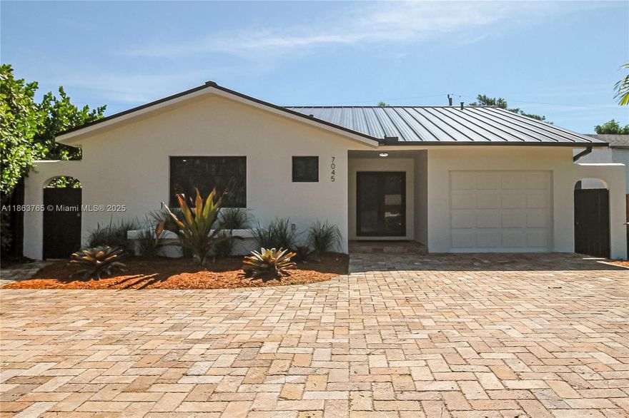 Beautifully Updated 4 Bedroom 2 Bathroom home with a finished garage adding square footage and 1 additional  Bedroom (making it a 4-2). Home has approximately 1780 sq ft of living space. 1780/$939,000=$527.53 per sq ft. Great price for the area. Home Features Quality Finishes Throughout with Bright Open Living Areas featuring Volume Ceilings, New metal roof, Impact Windows and Doors, Wood Kitchen Cabinets with Quartz Counter-tops, SS Appliances, Updated bathrooms.  Nice CBS detached storage building. Most Important is the Central Location, Sunset Pines area and ready to be moved into.