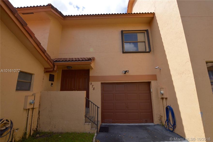 Wow- you don't want to miss out on getting this spacious and bright, corner unit townhouse- Wrap around screened in patio overlooking the serene canal-perfect for entertaining. Completely updated and very well kept 2 bedroom 2 and a half baths with a 1 car garage. - hurricane shutters, separate laundry, volume vaulted ceilings, community pool (steps away) , playground area, indoor basket and racquet ball courts, gym, gated entry and best of all low HOA fees.