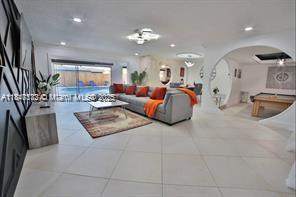 Beautiful 3 bedrooms and a den,2 full baths, in the desirable area of Sunrise. specious ,open space concept.
inground pool, with back yard furniture included. Billiard table and laundry room .NO HOA !
all appliances included. 10 Min from saw grass mall.
A MUST SEE!