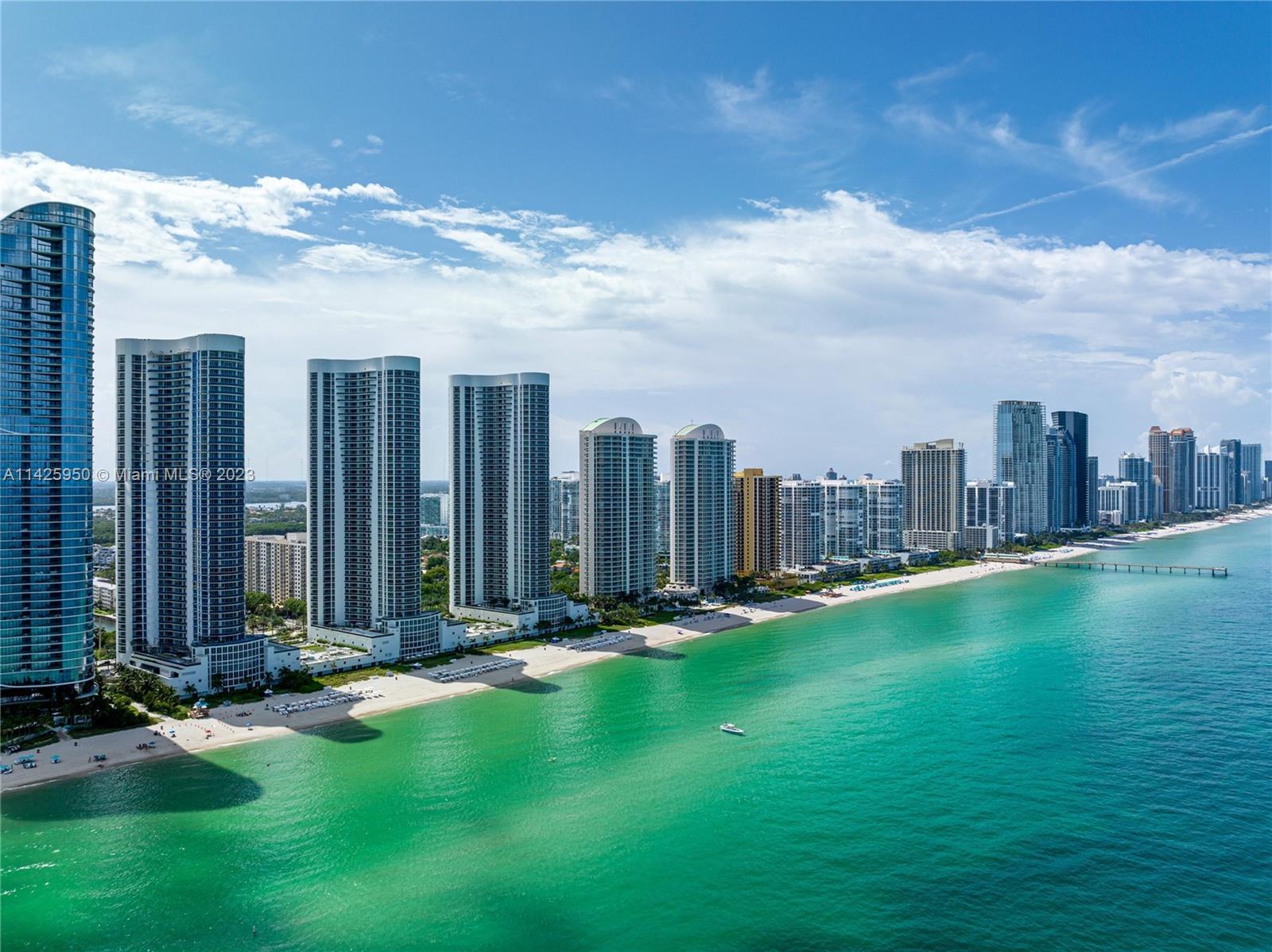 Welcome to your dream oasis in paradise! Experience luxurious oceanfront living in a spacious, fully renovated 3-bed, 3.5-bath condo with direct ocean view, 11ft ceilings, Italian marble floors, surround sound, and A/C with air purification technology. Indulge in the best quality cabinetry, deluxe granite countertops, Bosch espresso maker, and Wolf oven. Fantastic amenities, 2 valet parking spaces, gym, pool, beach service, SPA with sauna, steam room, jacuzzi, massage facility, clubrooms, and a comfortable beach-front restaurant. Conveniently located near Aventura Mall and Bal Harbour shops. Live your best life, revel in breathtaking views of the ocean, Intracoastal, marinas, Oleta River State Park, and the city, and make it your own paradise!