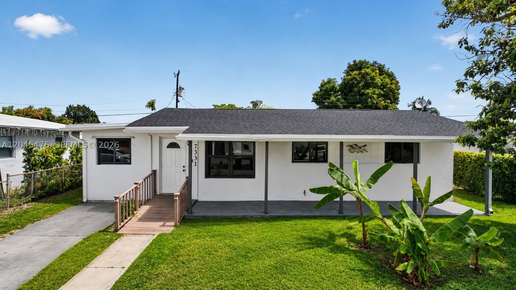 Photo of 7331 Garfield St, Hollywood, FL 33024 (MLS # A12045476)