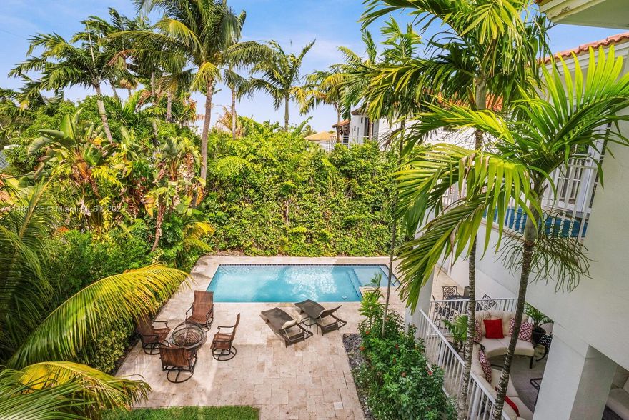 Welcome to 760 Glenridge Road, a stunning two-story elevated construction home on the coveted island of Key Biscayne. Built by renowned Miami Interscope contractors, this 6 bed, 6 bath coastal retreat is impeccably maintained. With 4,142 sqft, it features a solid foundation, impact windows, and high ceilings. The primary bedroom boasts bamboo textured wallpaper, two walk-in closets, and en-suite bathroom with spa tub. Downstairs, enjoy a separate informal living space, a formal living room, and spacious kitchen with updated appliances. In the backyard you'll find a large outdoor patio great for entertaining, a beautiful swimming pool, and lush high landscaping creating a private living experience. Key Biscayne offers a host of amenities, from pristine beaches, parks, and top-rated schools.