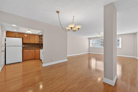 Photo of 111 Golden Isles Dr #D12, Hallandale Beach, FL 33009 (MLS # A11933384)