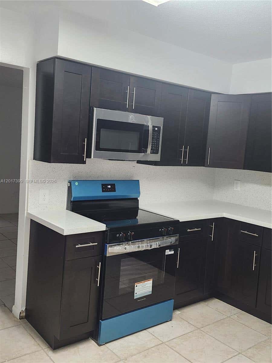 Photo of 3901 SW 51st St #3903, Dania Beach, FL 33312 (MLS # A12017399)