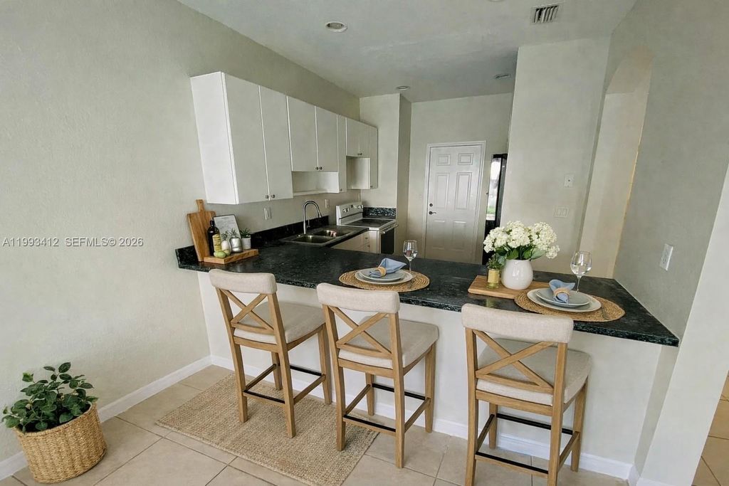 Photo of 4947 SW 135th Way, Miramar, FL 33027 (MLS # A11993412)