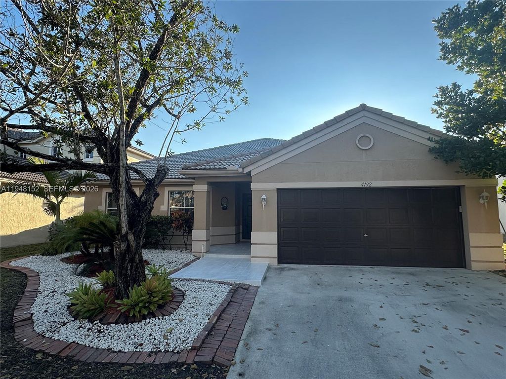 Photo of 4192 Laurel Ridge Cir #4192, Weston, FL 33331 (MLS # A11948152)