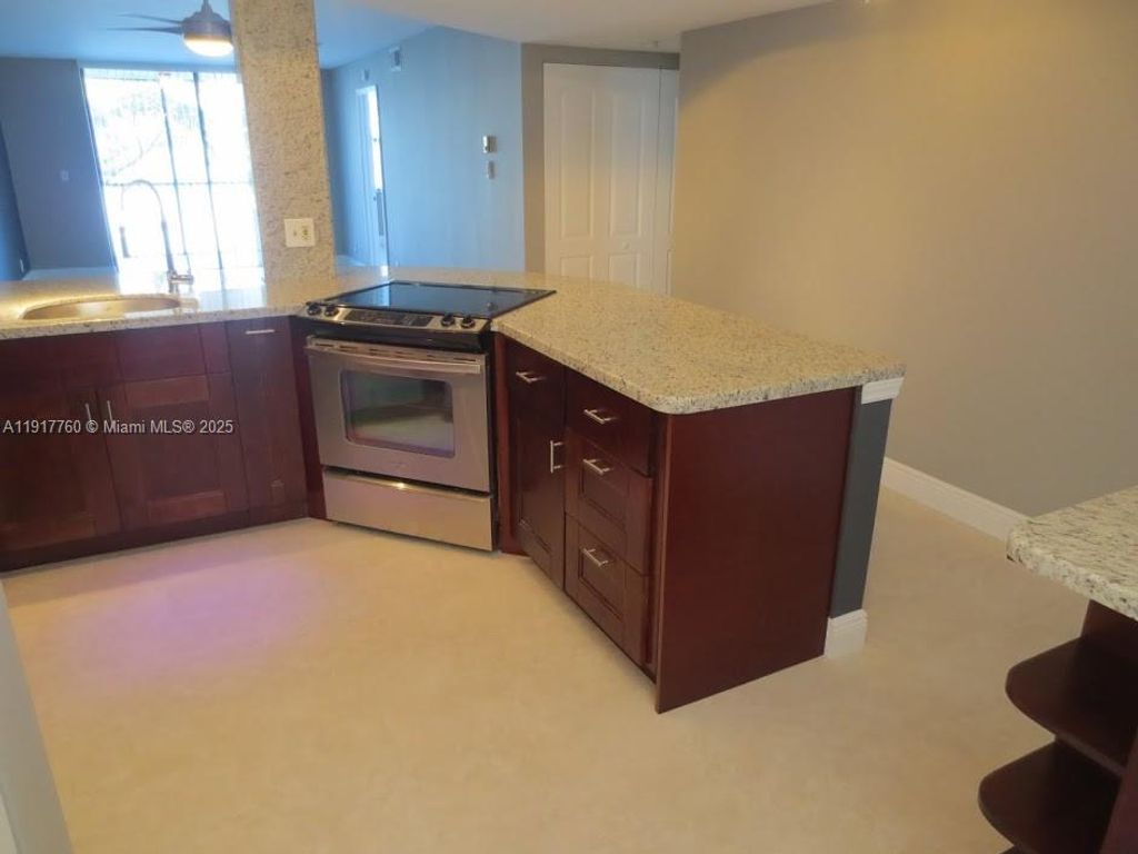 Photo of 115 Lake Emerald Dr #203, Oakland Park, FL 33309 (MLS # A11917760)