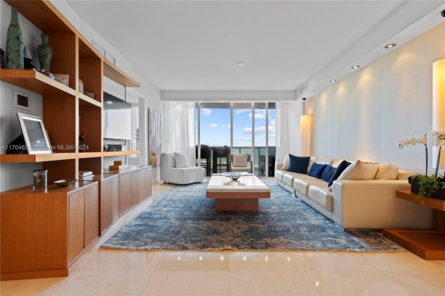 Experience Ultimate Luxury in Sunny Isles Beach with this fully furnished, professionally designed 3-bedroom, 3.5-bathroom oceanfront condo, now available for rent in the prestigious Trump Royale. Boasting 2,137 square feet of refined elegance, the unit features stunning white marble glass floors throughout, extensive wood paneling in the entertaining areas, automated blinds, and custom California closets. With spectacular direct ocean views, this condo combines style and comfort, high-end Miele and Sub-Zero appliances and custom cabinetry, Residents enjoy exclusive building amenities, including direct beach access with service, a state-of-the-art fitness center, spa, pool, tennis courts, valet parking, on-site dining, concierge services.