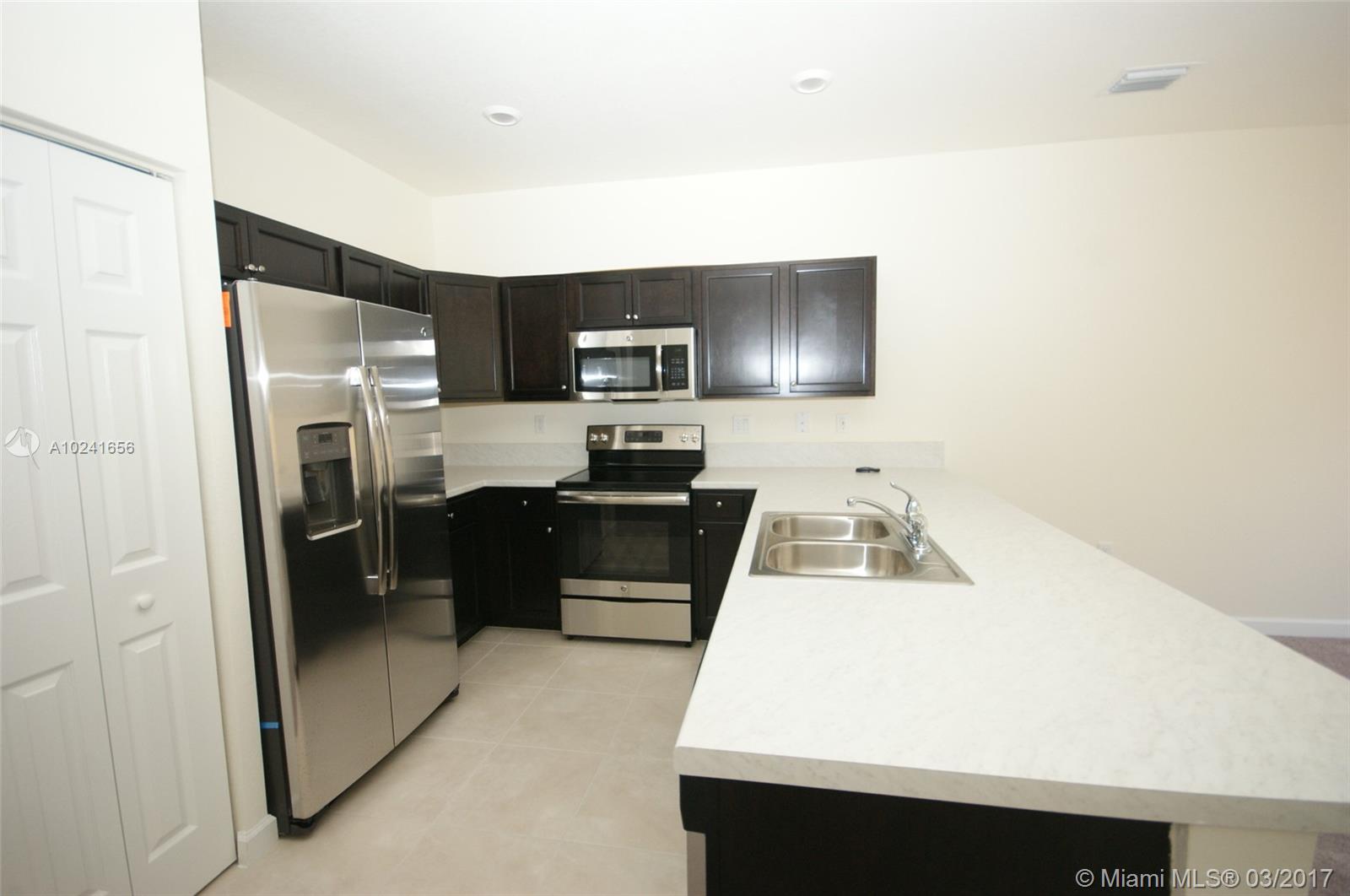 Brand new, never lived in Town-home with patio and grass area. Nice living area downstairs with all the bedrooms and laundry room upstairs.