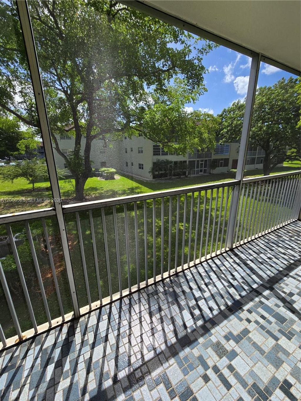 Photo of 13500 SW 1st St #204U, Pembroke Pines, FL 33027 (MLS # A12000528)