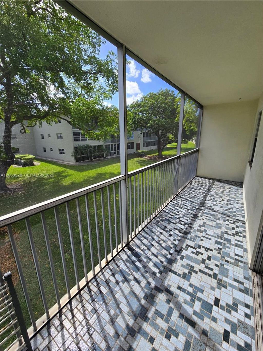 Photo of 13500 SW 1st St #204U, Pembroke Pines, FL 33027 (MLS # A12000528)